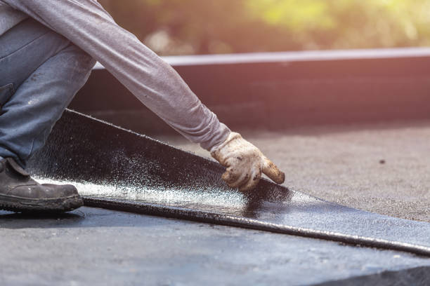 Professional Waterproofing technician working in Ghent, KY
